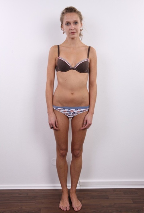 Solo girl Martina stands bare naked while launching her modelling career