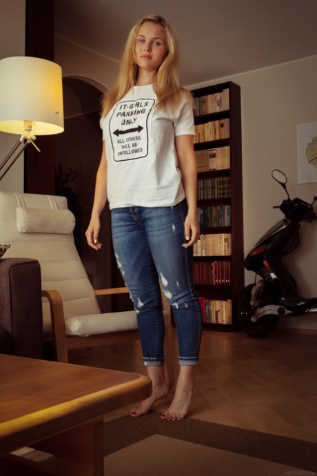 Blue-eyed teen Caroline Abel exposing her big ass and tits in a solo